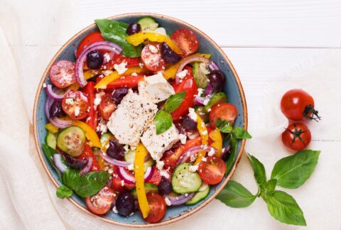 colorful green salad as part of heart healthy mediterranean diet